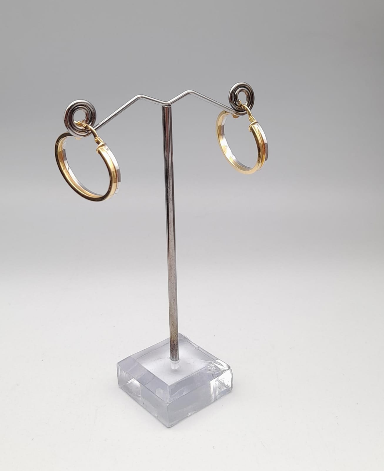 Aros en oro amarillo y oro blanco